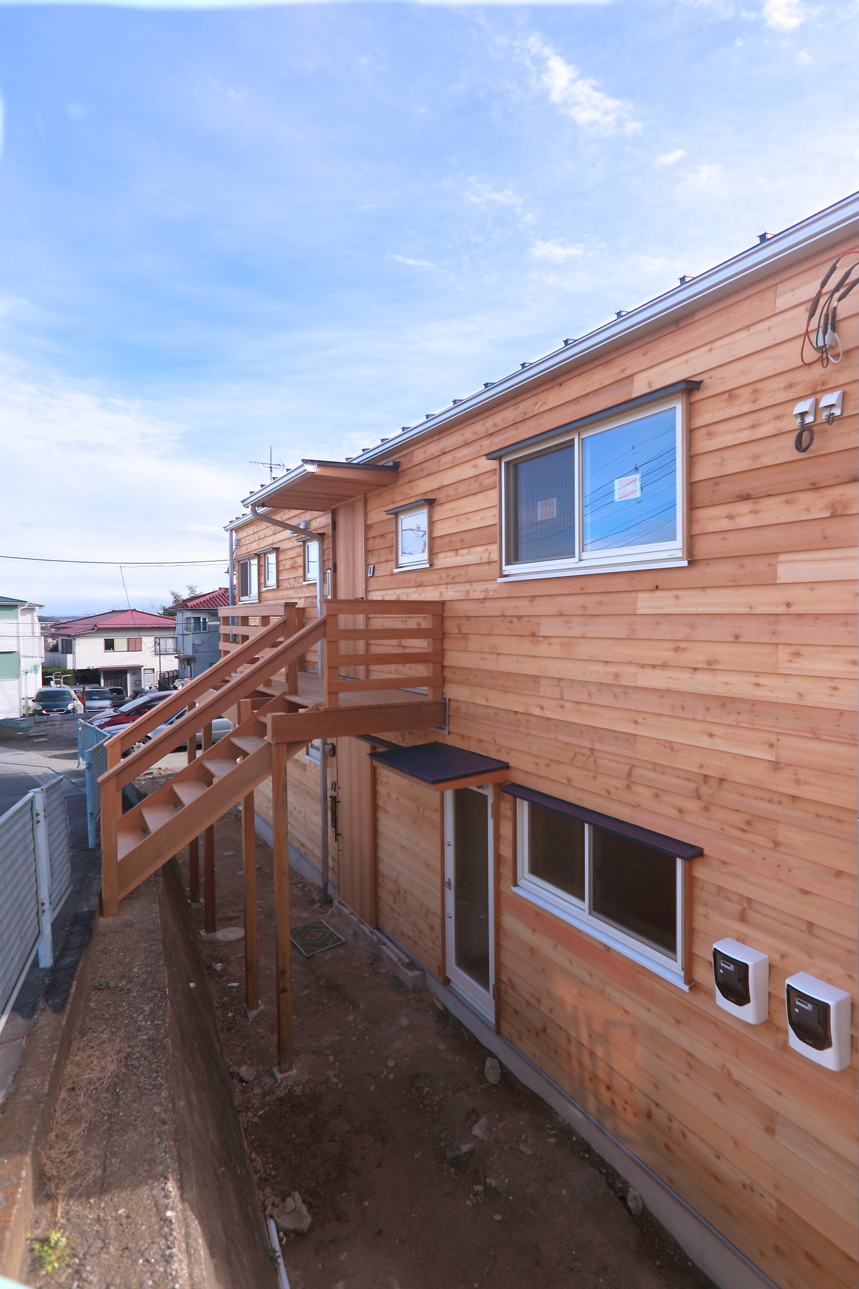 高台に建つ三世代同居の家